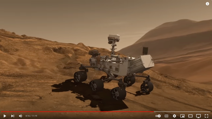 A Video Of A Mars Rover On A DesertDescription Automatically Generated